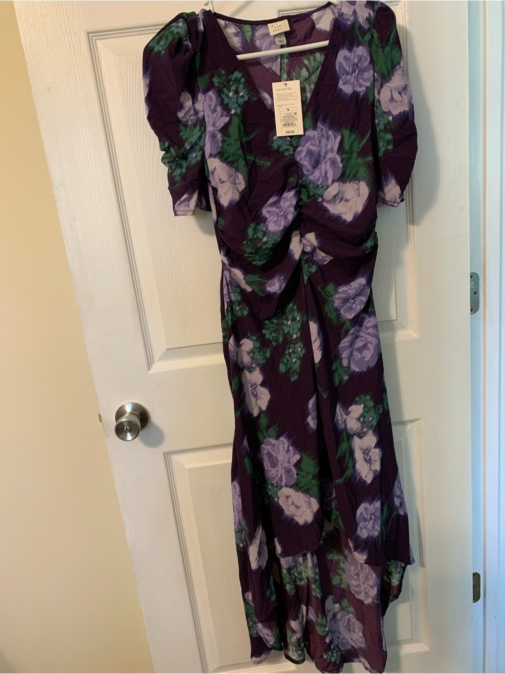 A New Day size small NWT’s dress; higher in front than back